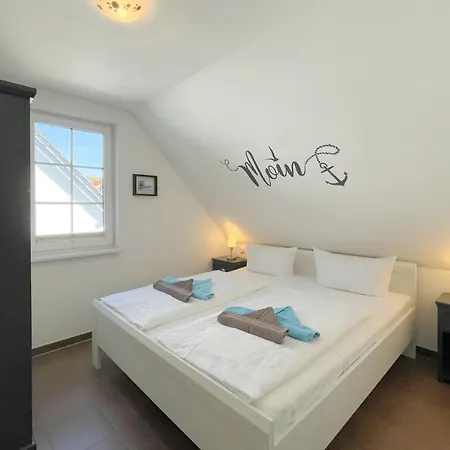 Appartement Am Kuestenwald 9 Seemoewe