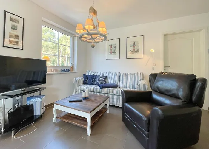 Апартаменты Am Kuestenwald 9 Seemoewe *