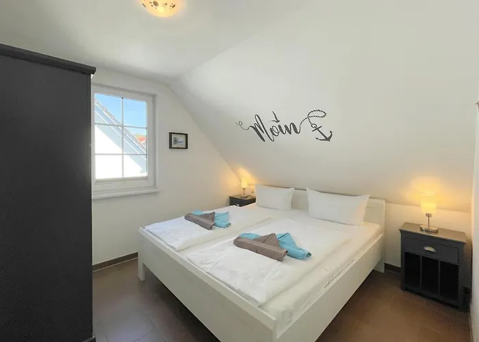 Апартаменты Am Kuestenwald 9 Seemoewe