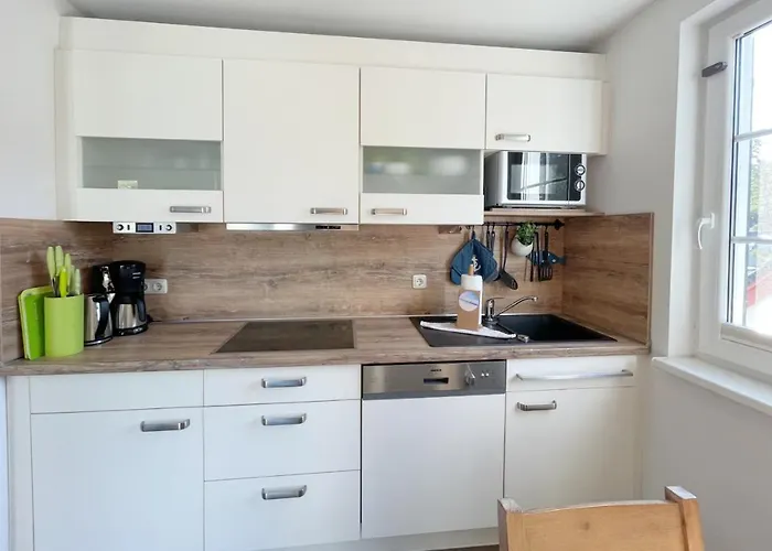 Апартаменты Am Kuestenwald 9 Seemoewe *